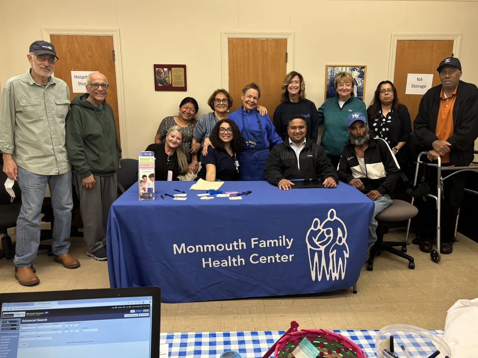 A Monmouth Family Health Center information table at the pantry.