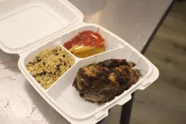 A chef-prepared lunch in a take-away container.