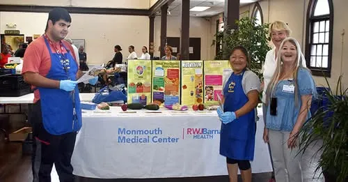 A Monmouth Medical Center nutrition education table at the pantry.
