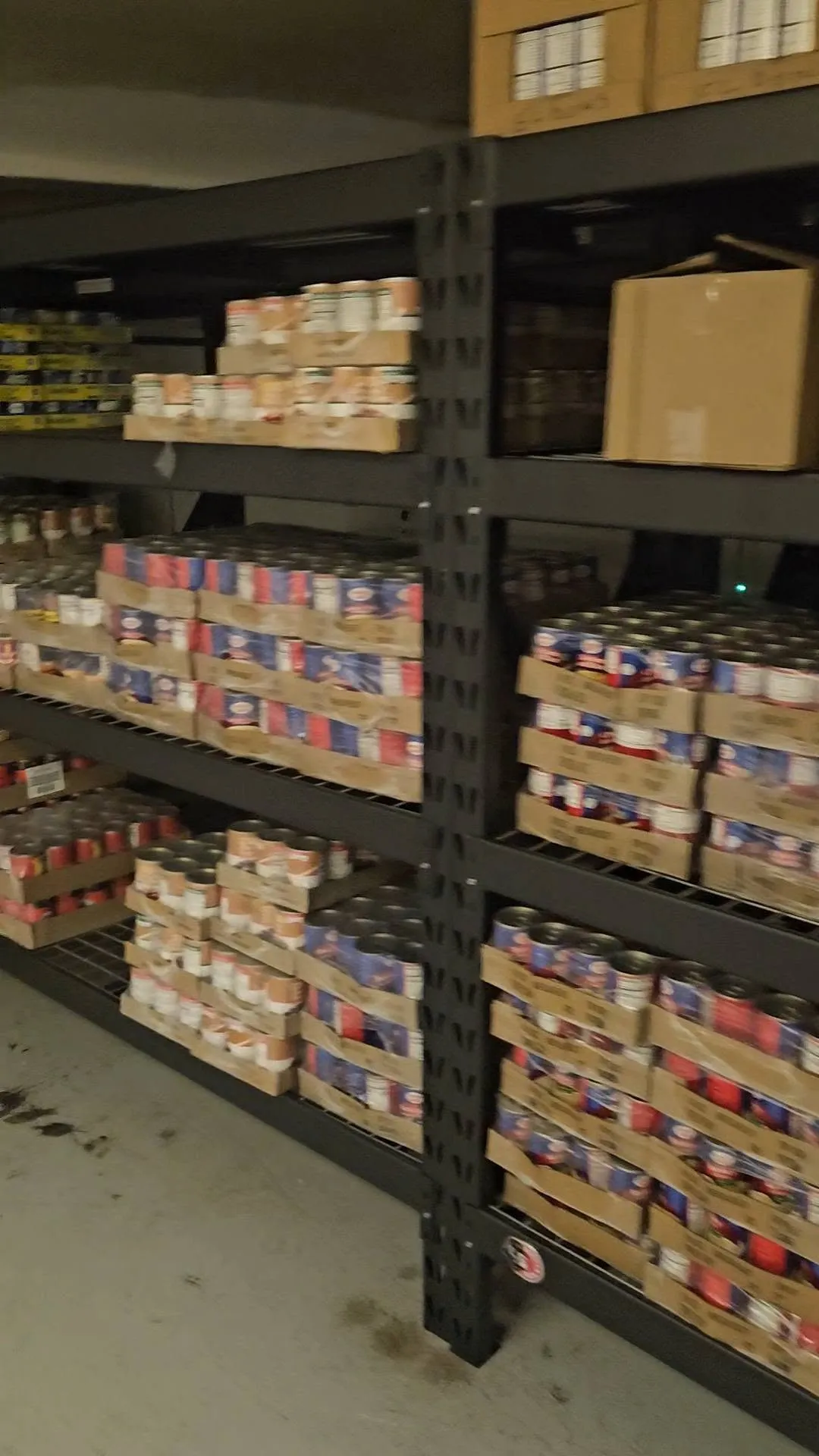 Pantry shelves stocked with food.